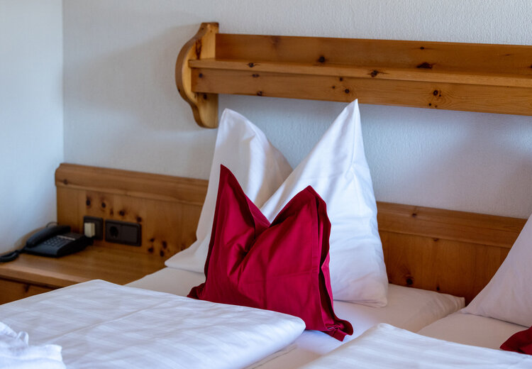 Hotelbett in der Superior Suite im Hotel Konradin